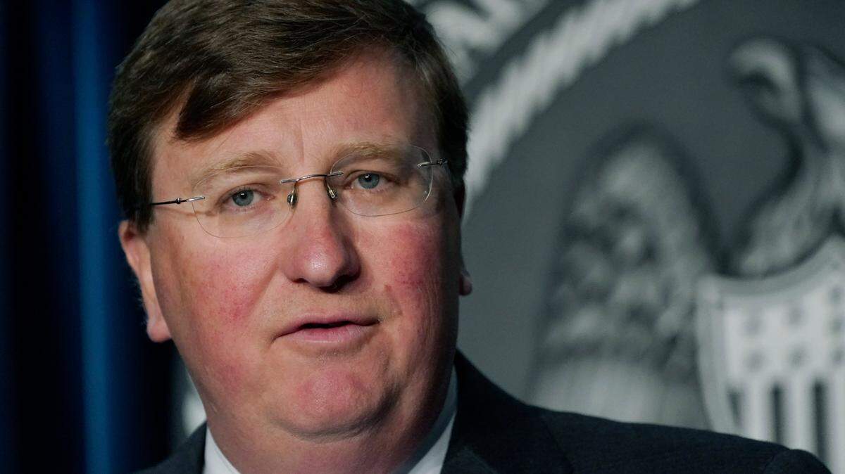 Gov. Tate Reeves responds to a reporter’s question during a news briefing regarding Mississippi’s COVID-19 response in Jackson, Miss., Thursday, Aug. 19, 2021.