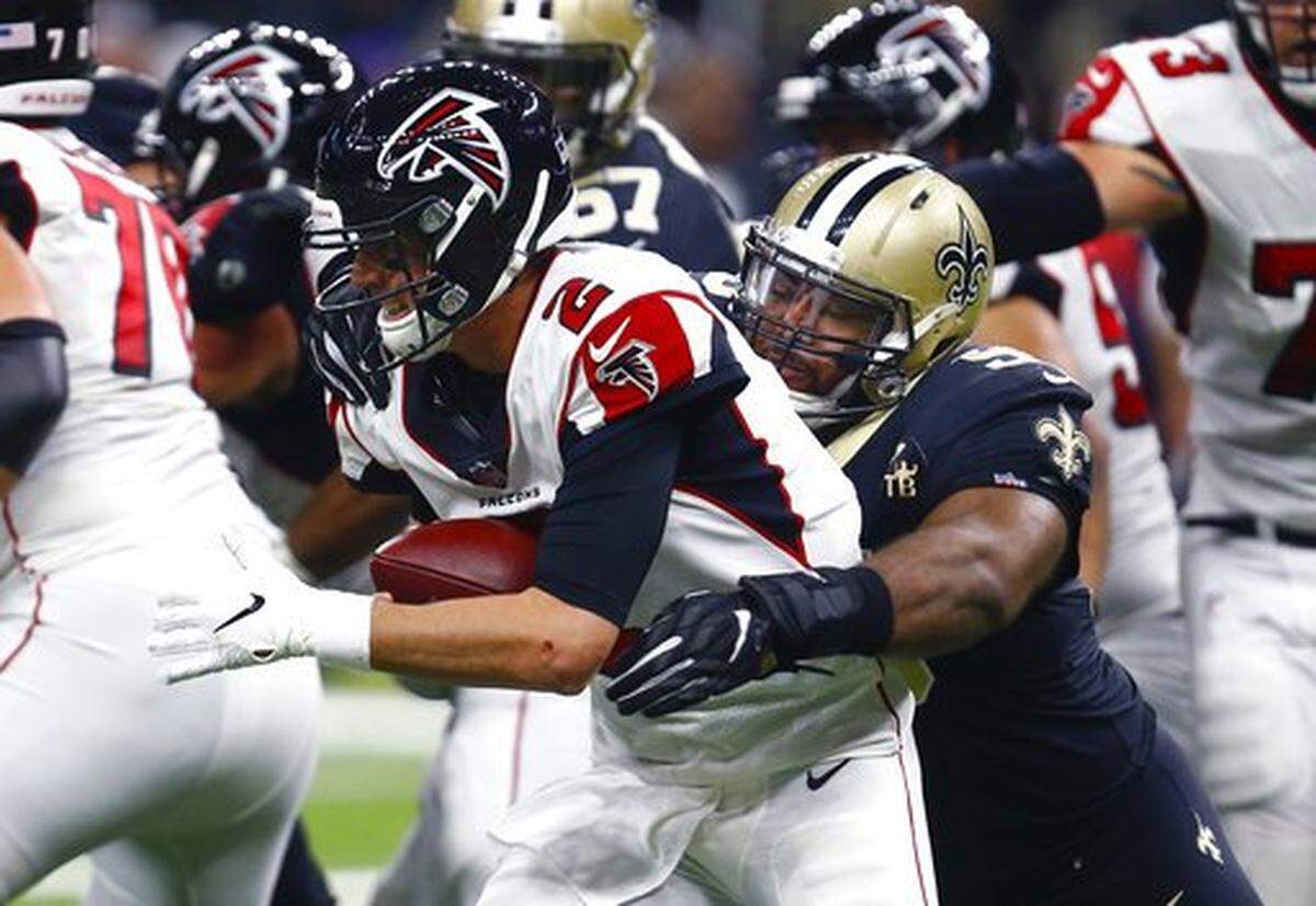 New Orleans Saints defensive tackle Sheldon Rankins (98) tries to sack Atlanta Falcons quarterback Matt Ryan (2) in the first half of an NFL football game in New Orleans, Thursday, Nov. 22, 2018. (AP Photo/Butch Dill)