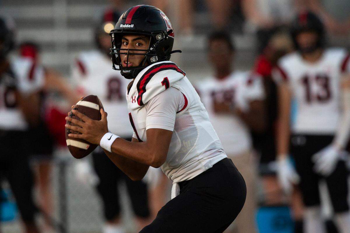 St. Stanislaus quarterback Ian Gael Gonzalez Rioz throws a pass during a game at Bay High in Bay St. Louis on Friday, Sept. 1, 2023.