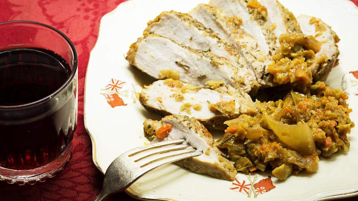 SCOTT SUCHMAN THE WASHINGTON POSTHerb-Rubbed Pork Chops With Warm Broccoli Slaw.