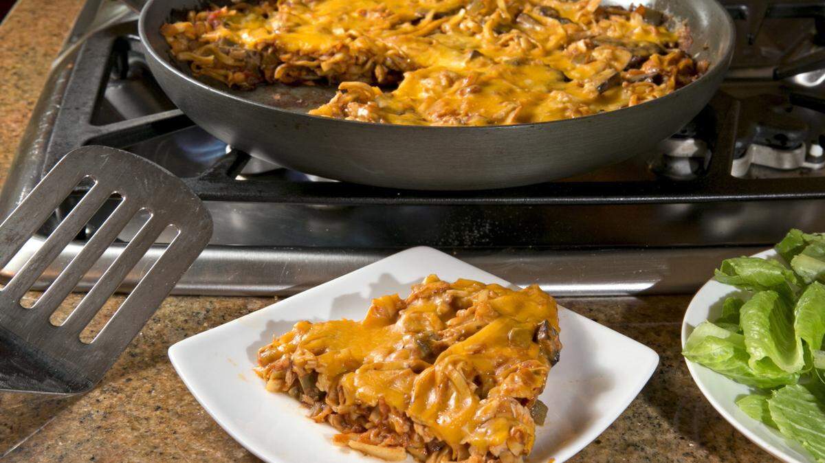 AL DIAZ/MIAMI HERALD/TNSTuna Skillet Pie is a one-dish meal that can be prepped and cooked in fewer than 30 minutes.