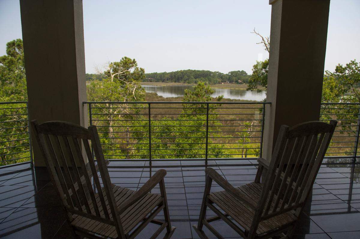 One of several balconies inside a house for sale off of Rue Rivage in Ocean Springs on Friday, June 9, 2023.