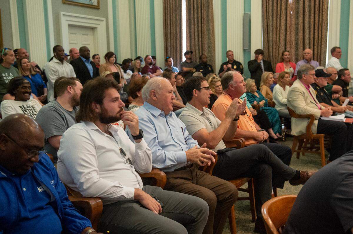 Community members, police officers, business owners and members of the media attend a Biloxi City Council meeting at Biloxi City Hall on Tuesday, April 18, 2023 over the incidents of Black Spring Break.