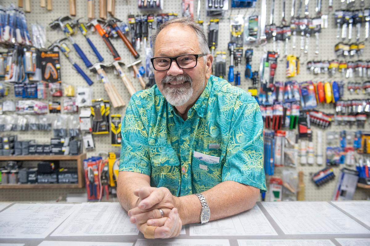 David Hubbard, who owns Hubbard’s Waveland Hardware with his brother, poses for a portrait behind the counter at the shop in Waveland on Monday, Oct. 7, 2024. Hubbard will be featured in a documentary series produced by a United Kingdom based company.