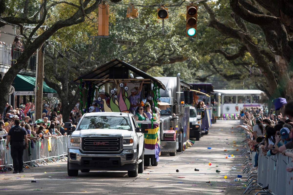 The Ocean Springs Elks Club Mardi Gras Parade makes its way along Washington Avenue in Ocean Springs on Saturday, Feb. 15, 2025.