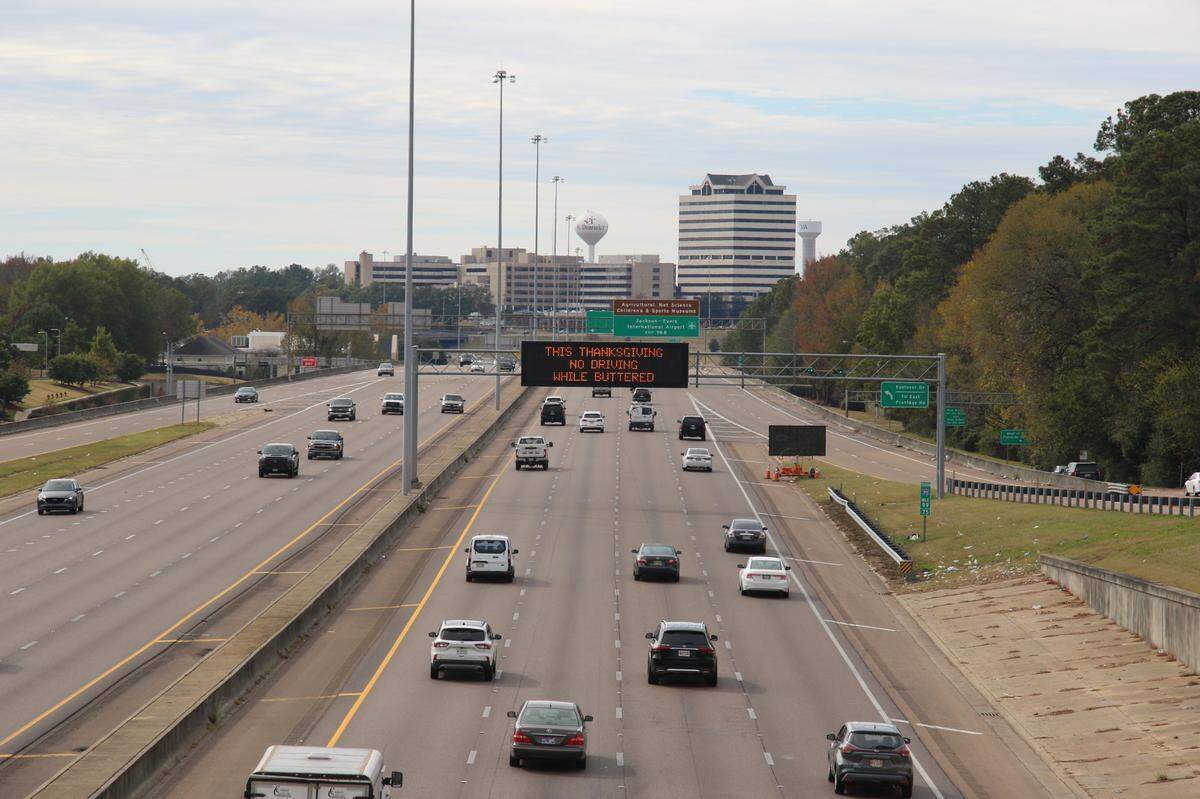 A sign written by Michael Flood of the Mississippi Department of Transportation reads “This Thanksgiving no driving while buttered.”
