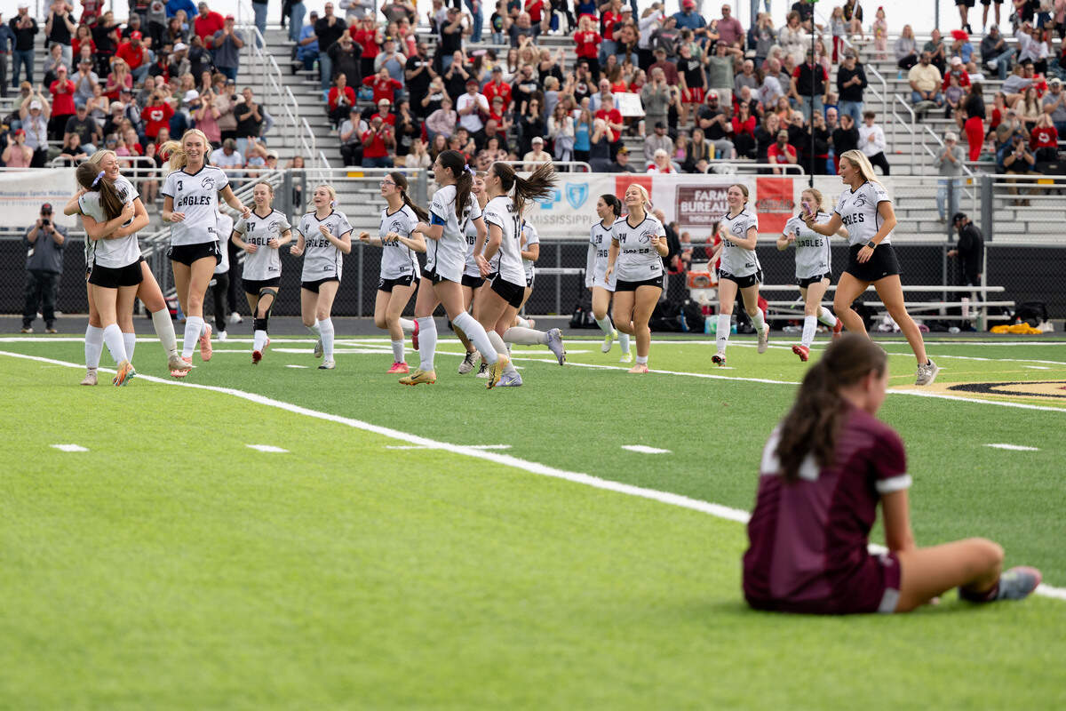 Florence players rush the field to celebrate after the Class 5A girls soccer state championship game at Germantown High School in Jackson on Saturday, Feb. 21, 2026.