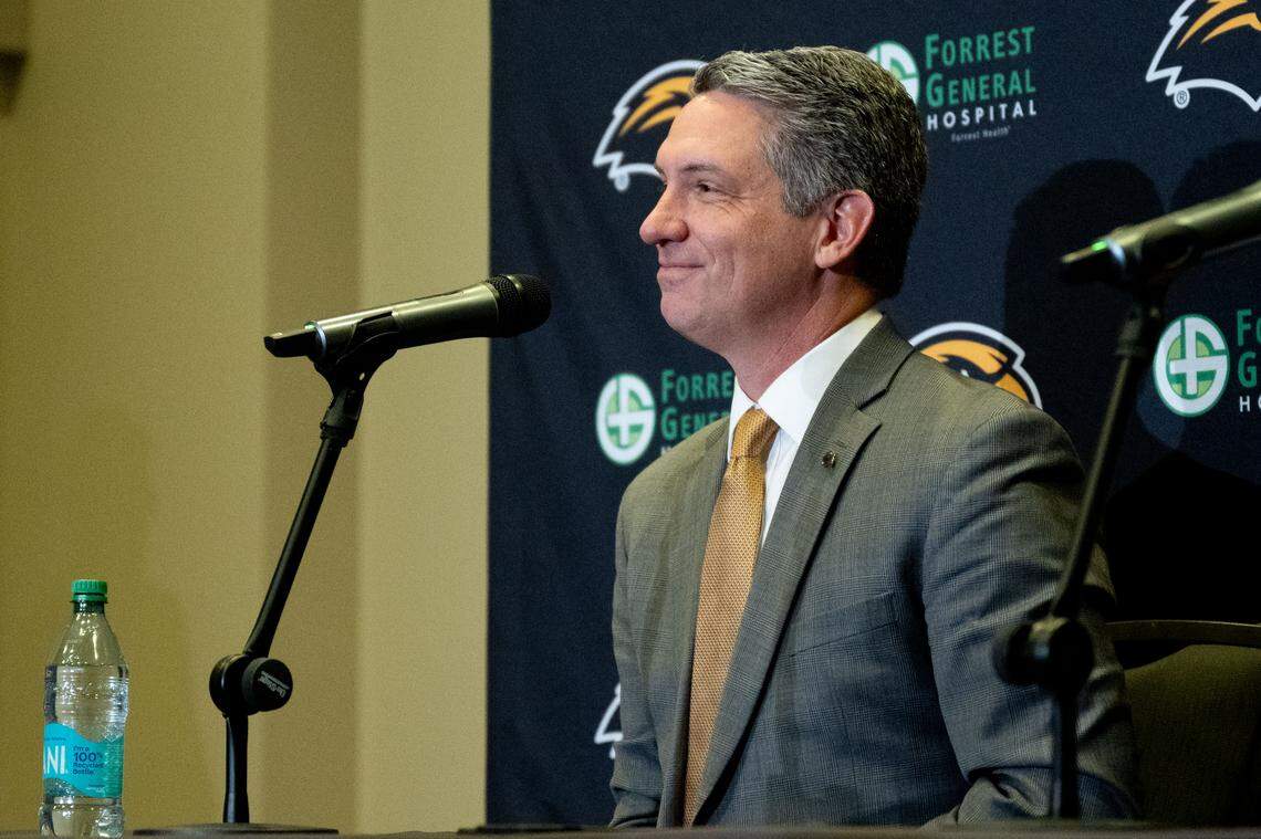 Southern Mississippi Athletic Director Jeremy McClain takes questions at a news conference at the Trent Lott National Center in Hattiesburg on Dec. 15, 2025.