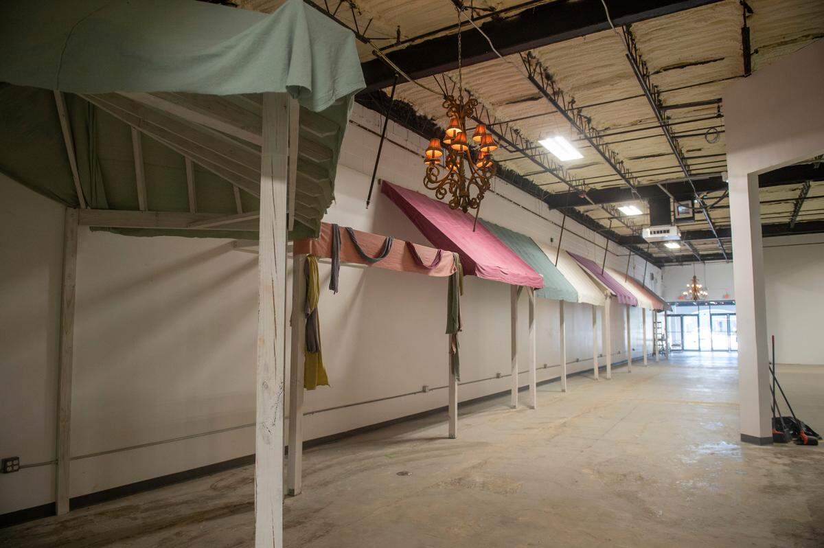 Colored awnings inside the new Mississippi Antique Galleria in Gulfport give the appearance of a Main Street shopping experience.