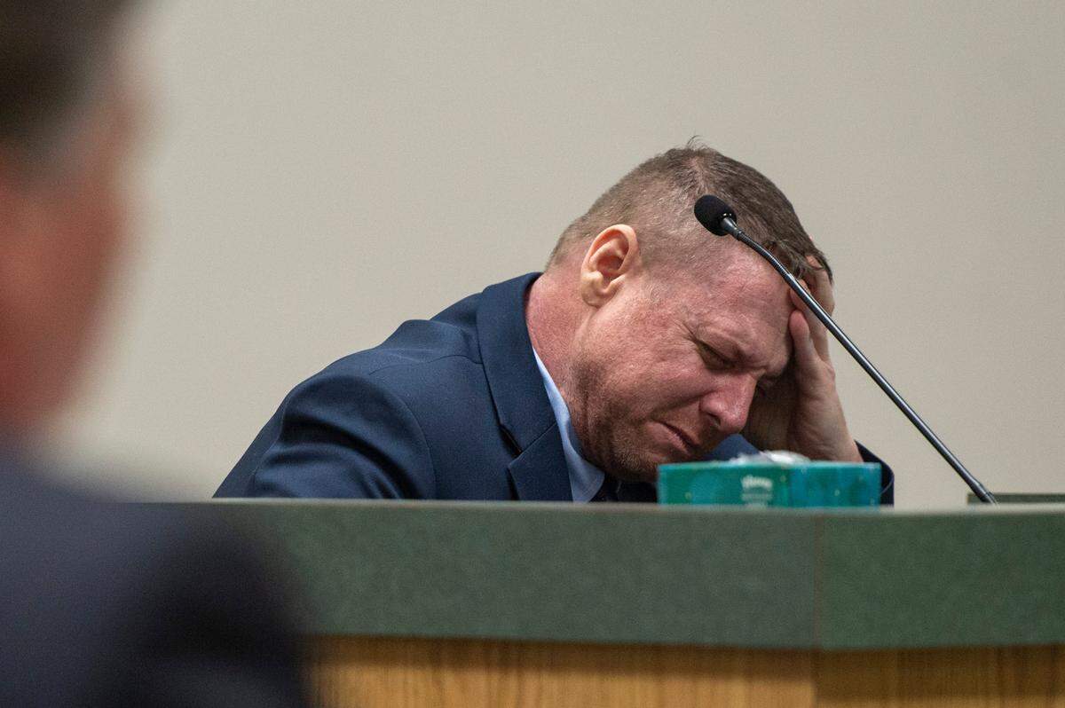 Jacob Blair Scott, who is accused of sexually assaulting a minor, cries out while on the witness stand after testifying about his family relationships after being asked an unrelated question during his trial in Jackson County Circuit Court in Pascagoula on Wednesday, June 1, 2022.