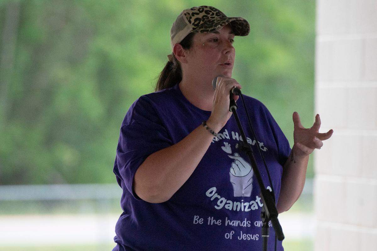 Laura “Dannette” Necaise founder of The Kind Hearts Organization speaks during a candlelight vigil her organization organized in honor of Gracelynn Vick at Saucier Park on Tuesday, April 22, 2025.