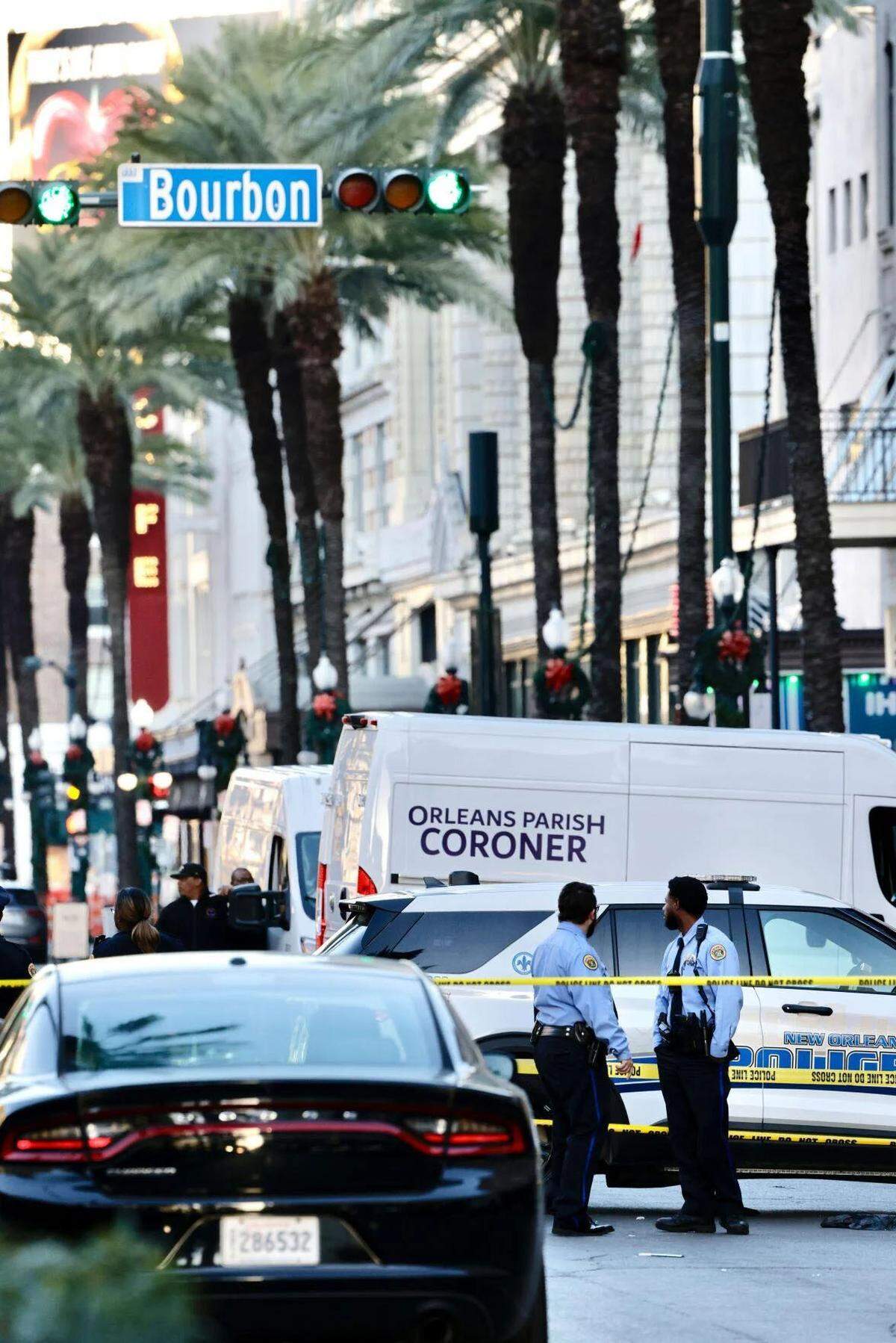 A coroner van is parked on Bourbon Street after a Wednesday morning ‘mass casualty event.’
