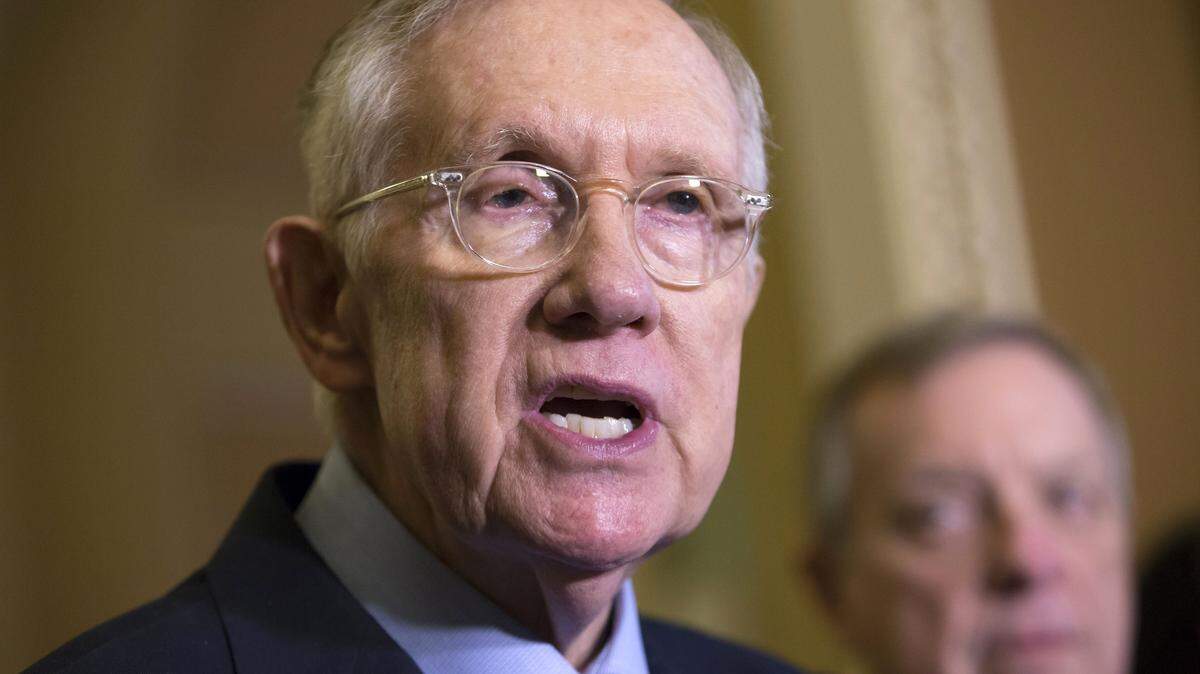 In this Dec. 1, 2015, photo, Senate Minority Leader Harry Reid of Nev., left, joined by Senate Minority Whip Richard Durbin of Ill., right, speaks with reporters following a weekly policy meeting on Capitol hill in Washington. Senate Republican leaders seem to have accomplished a balancing act in their drive to dismantle President Barack Obamaís health care law and block Planned Parenthoodís funding. Theyíre poised to push a measure through the Senate stuffed with victories for conservatives and concessions for more moderate GOP senators facing competitive 2016 re-election races. (AP Photo/J. Scott Applewhite)