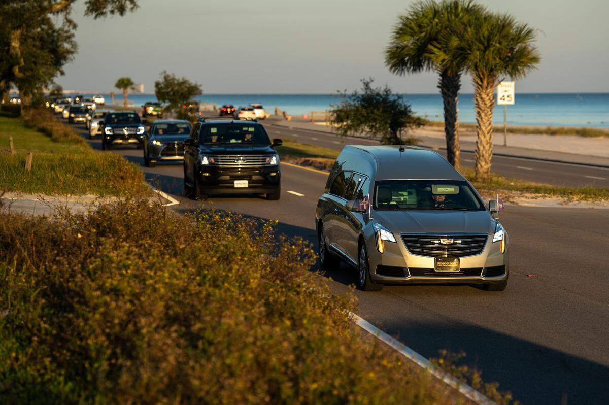 A funeral procession drives down Highway 90 to bring Abby Bosarge, a Pass Christian teen who died of cancer, to her final resting place at Live Oak Cemetery in Pass Christian on Tuesday, Nov. 2, 2021.