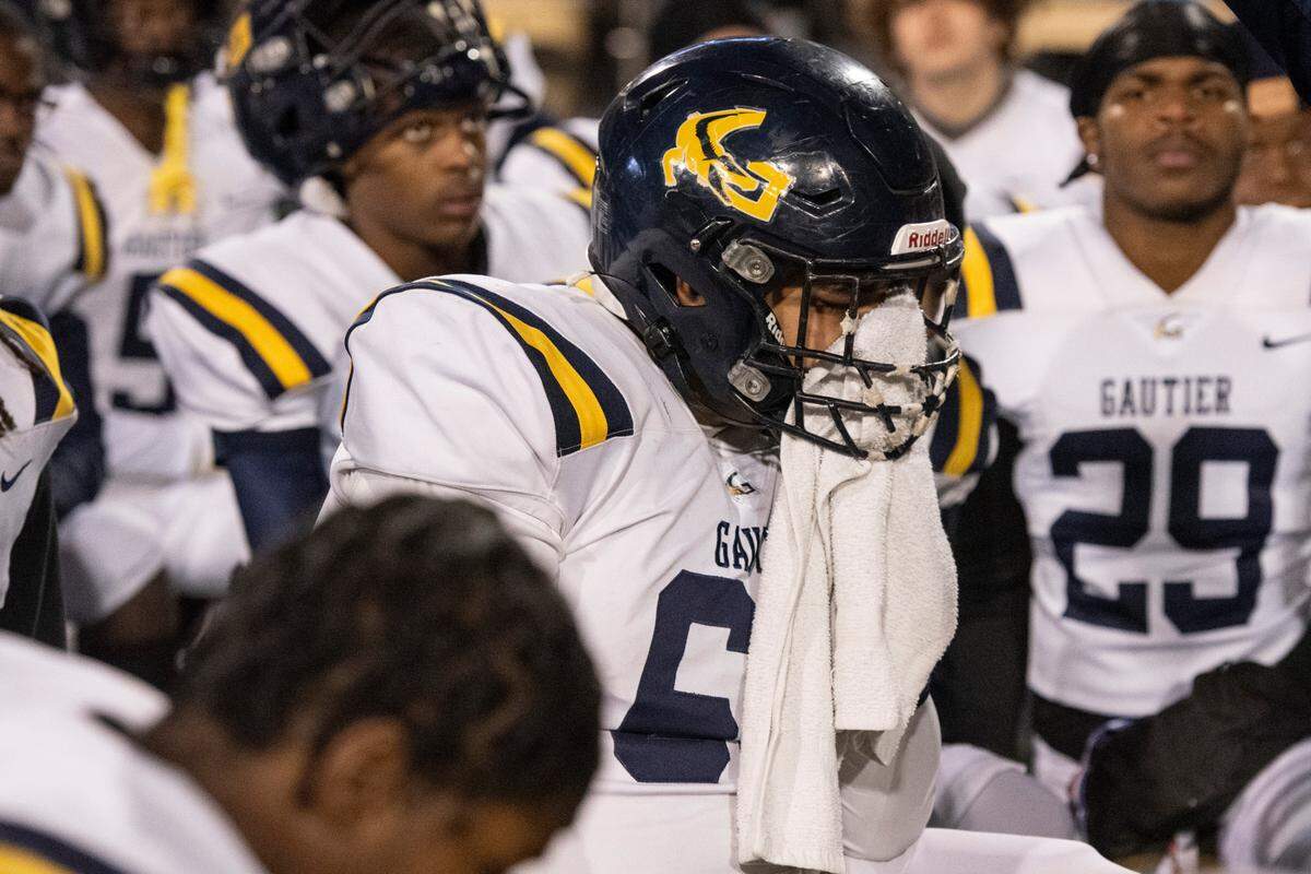 Gautier players react after Gautier lost the MSHAA Class 5A Football Championship at M.M. Roberts Stadium in Hattiesburg on Friday, Dec. 6, 2024.