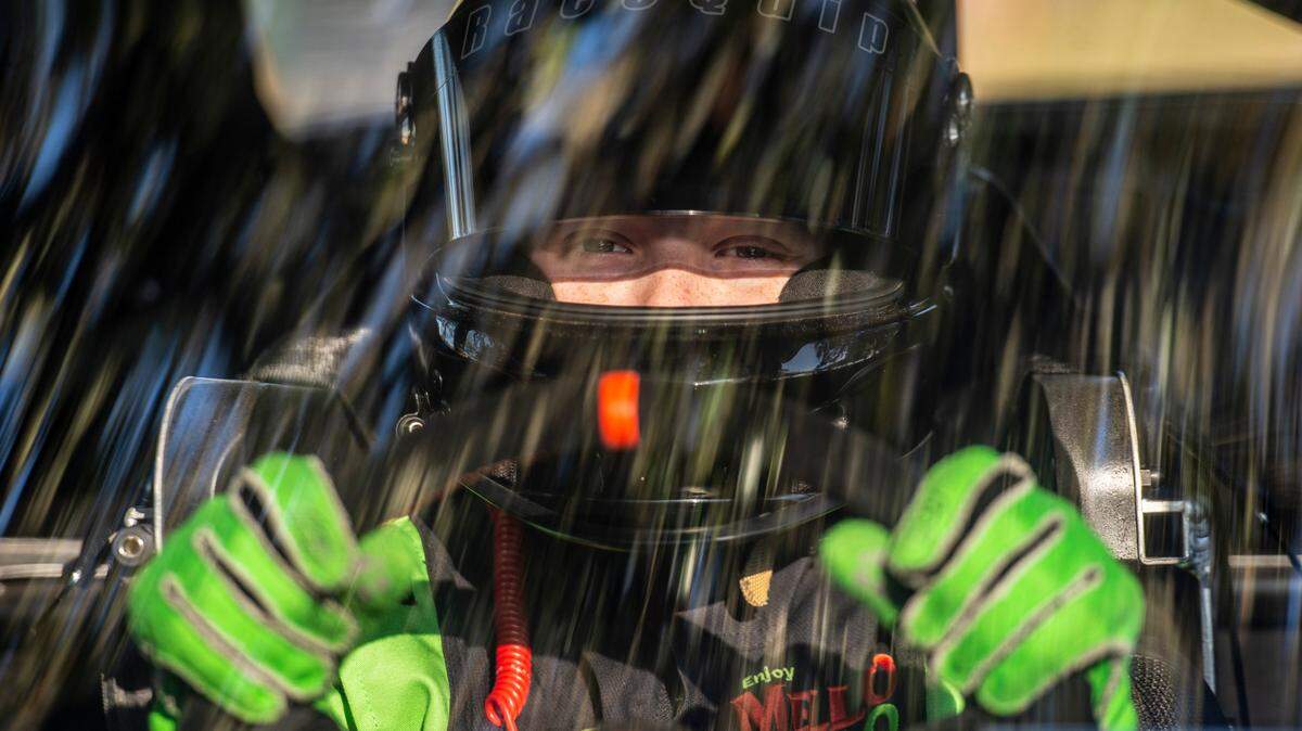 Nicholas “Cole” Denton, 11, also known as “Cole Trickle”, after the iconic Days of Thunder movie character, sits at the wheel of his racecar at Pascagoula Beach Park in Pascagoula on Thursday, March 10, 2022.