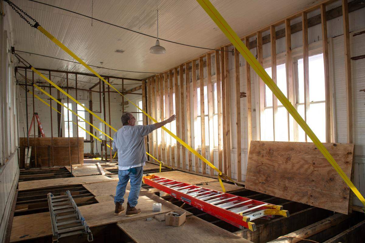 Steve Poynor, project supervisor for C. Roberds General Contractors, stands in the old Pascagoula train station in Pascagoula on Wednesday, Jan. 29, 2025. The building is being renovated to becoming home to the newest location of Chandeleur Island Brewing Company.