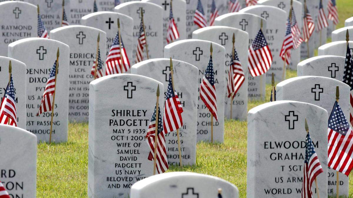 TIM ISBELL/SUN HERALD/FILEThe headstones at Biloxi National Cemetery, shown here in 2015, are decorated with American flags for today's Memorial Day ceremony at 9 a.m.