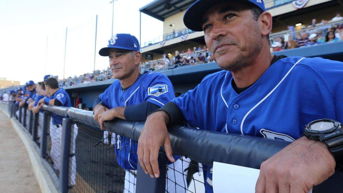 JOHN FITZHUGH/SUN HERALDBiloxi Shuckers Manager Mike Guerrero, right, and coach Sandy Guerrero wait for the start of the teams opening game of the season at MGM Park in Biloxi on Thursday April 7, 2016.