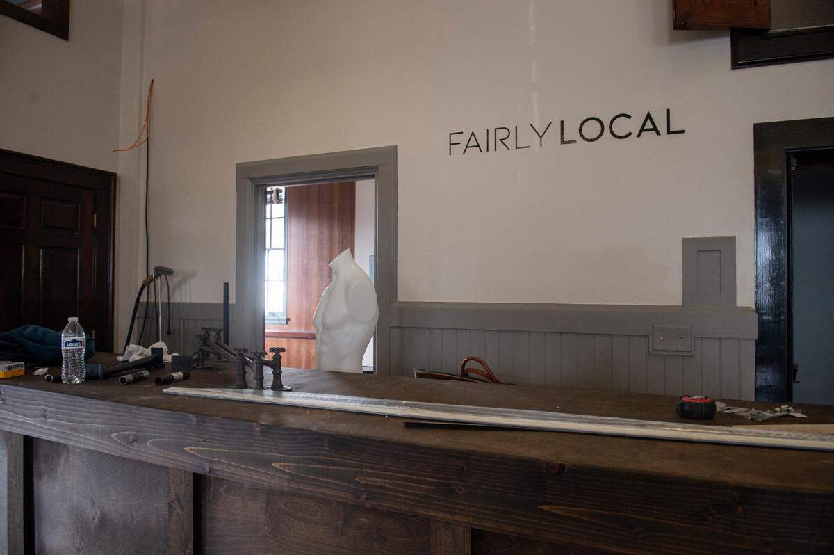 The future checkout counter at Fairly Local, a new menswear shop in the old post office building in Bay St. Louis on Thursday, Dec. 7, 2023. The shop, which is the second in a small chain, will have an in-store barber shop, coffee shop, humidor for cigars and a variety of menswear brands.