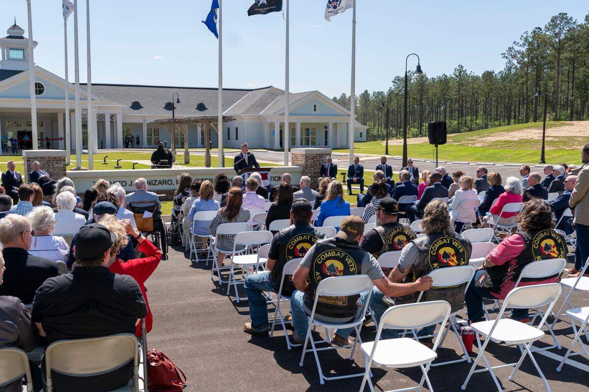 Mississippi Veterans Affairs Chairman James “Max” Fenn addresses a crowd of state officials, veterans and community members during the April 11 ribbon-cutting ceremony.