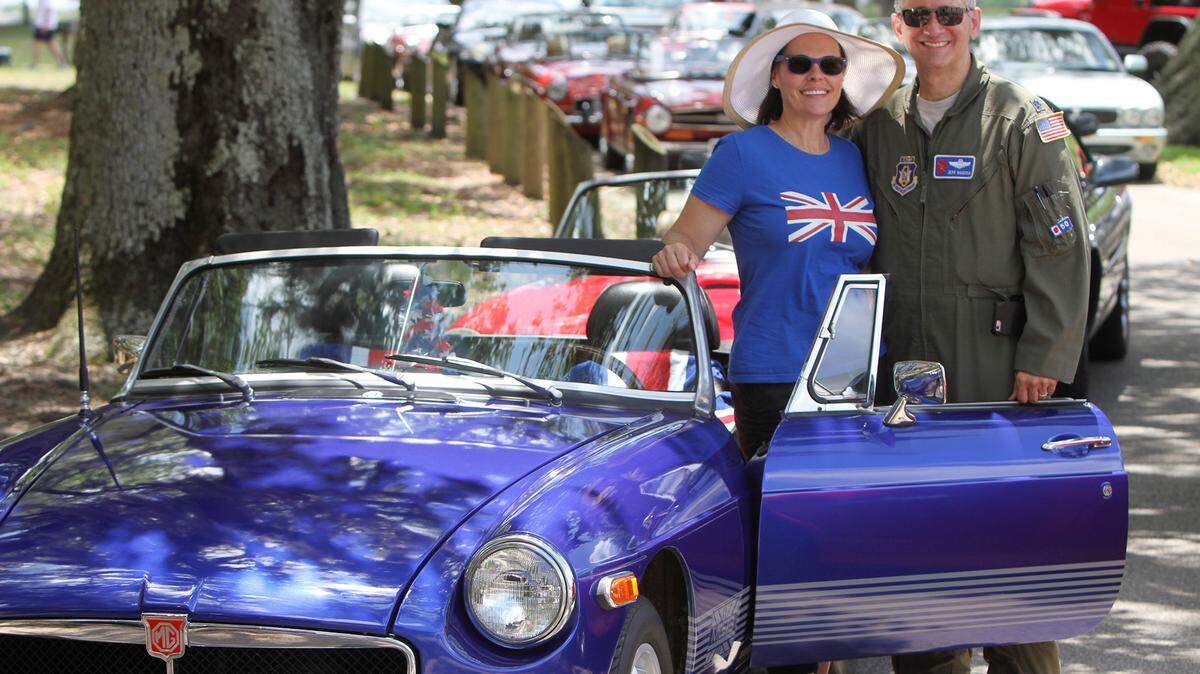 JOHN FITZHUGH/SUN HERALDLt. Col. Jeff Ragusa and his wife, Susan, pose with their 1974 MGB during a meeting of theThe British Car Club of New Orleans at Keesler Air Force Base on Saturday May 21, 2106.