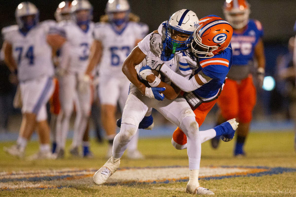 Nolan Wells gets tackled during a game against Gulfport at Milner Stadium on Oct. 27, 2023. Ocean Springs beat Gulfport, 30-7.