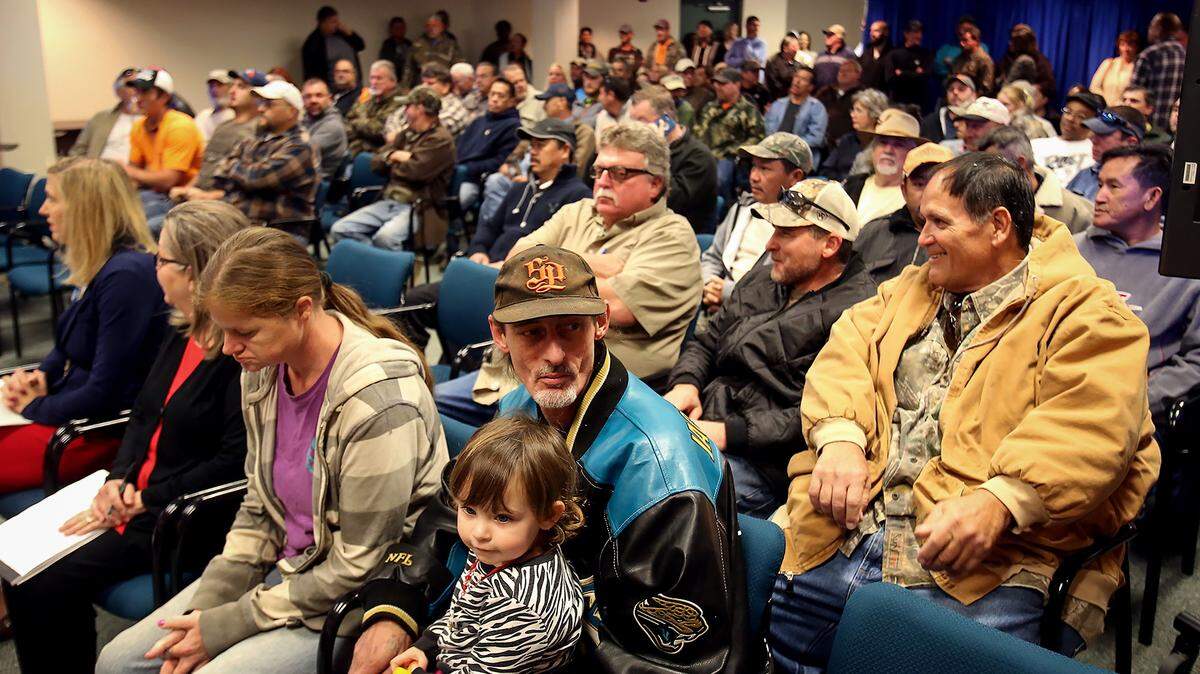 AMANDA McCOY/SUN HERALD 
 Oystermen crowd the meeting room at the Bolton Building to hear about the Mississippi Department of Marine Resources emergency oyster resource recovery program on Wednesday, January 13, 2016, in Biloxi. Due to the opening of the Bonnet Carre Spillway on Sunday, DMR is planning on relocating live oysters away from danger.