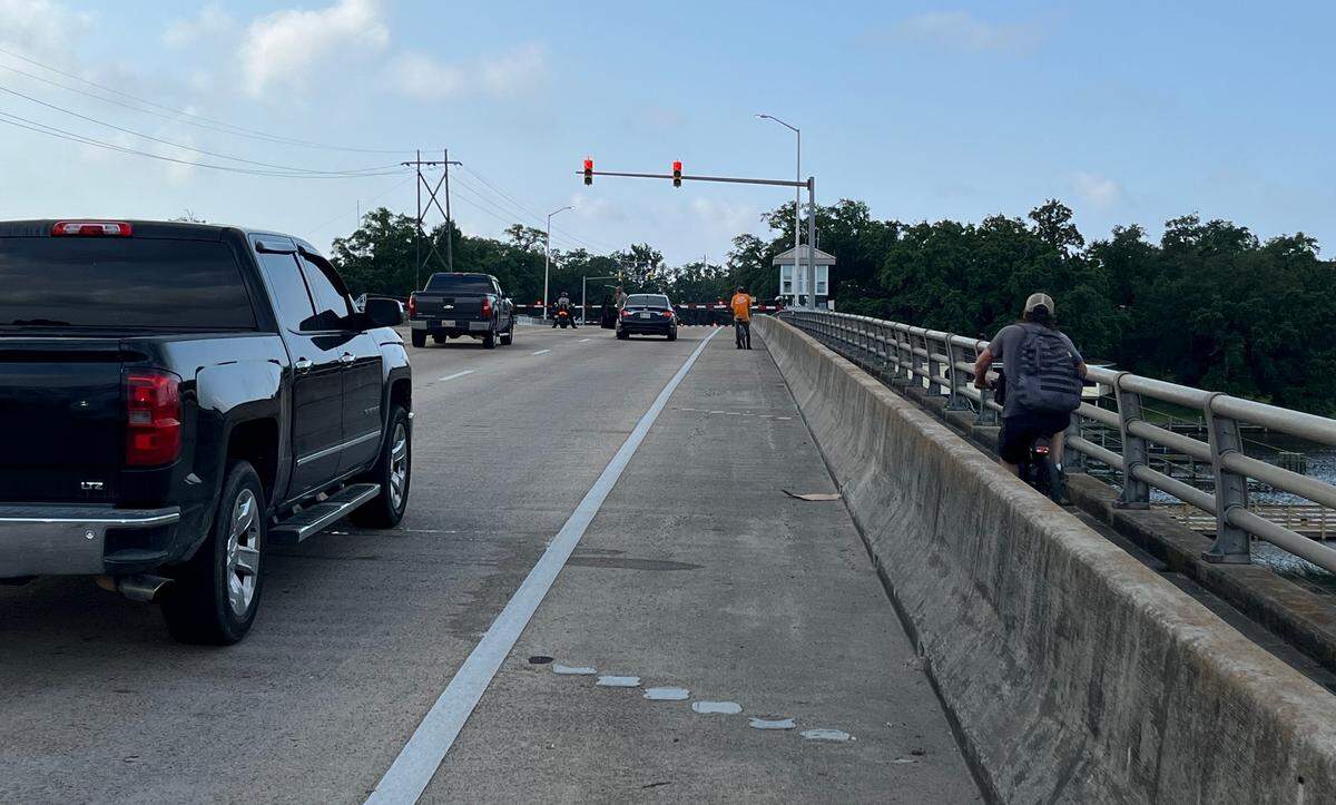 Traffic is stalled Saturday on the Fort Bayou Draw Bridge in Ocean Springs.