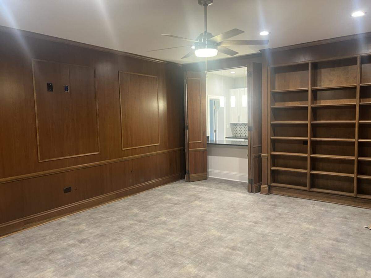 Sturdy shelves from the former law office add storage and a classic touch to the District Flats luxury apartments in downtown Pascagoula.