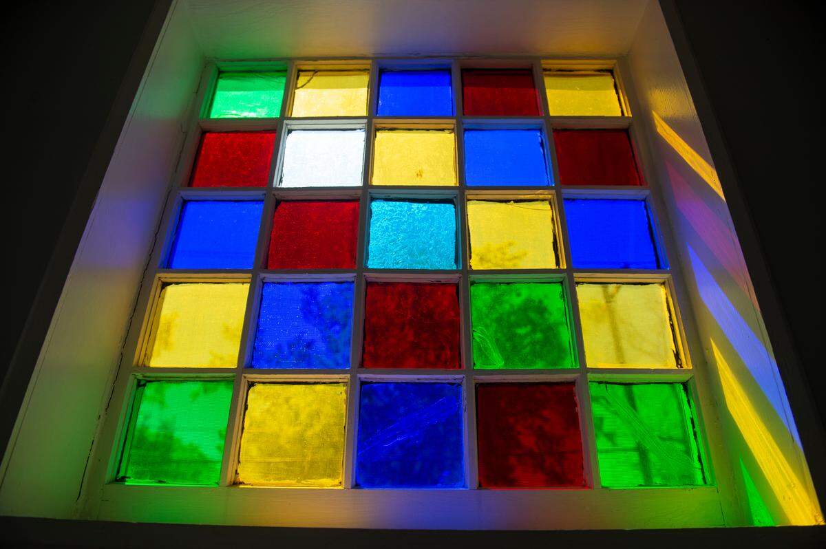 An original window in the entryway at the Seven Gables house in Ocean Springs on Thursday, March 28, 2024.