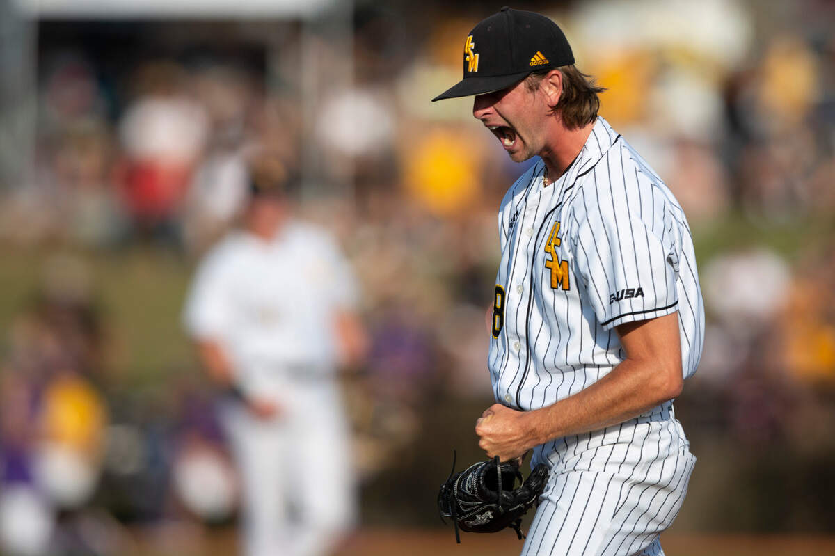 Southern Miss pitcher Dalton Rodgers cheers after striking out an LSU player during the NCAA Regionals at Pete Taylor Park in Hattiesburg on Monday, June 6, 2022.