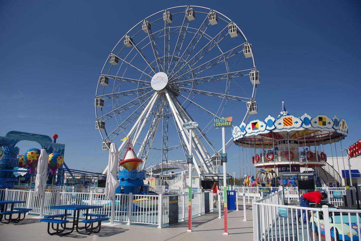 Opening day of Paradise Pier Fun Park at 3 p.m. on 3/3/23 brought blue skies and a crowd of people eager to try the 15 rides. The amusement park is part of Margaritaville Resort Biloxi.