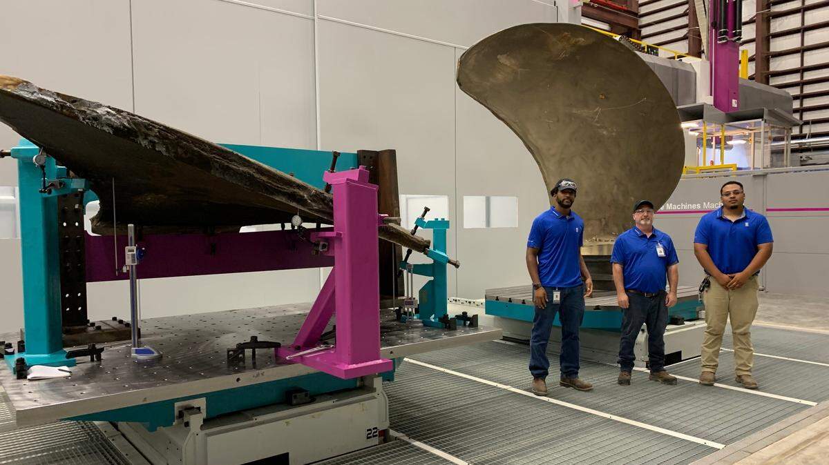 Stephen Moffett, left, of Pascagoula, is the first apprentice at Rolls-Royce. He works on the manufacture of a blade for a Navy ship with Stacy Shows of Lucedale, center, and Jesus Avila of Pascagoula at the new Rolls-Royce facility in Pascagoula.