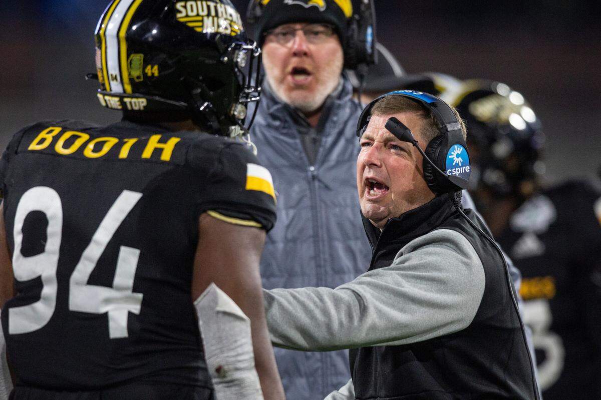 Southern Miss Coach Will Hall yells at Southern Miss’ Kristin Booth during the Lending Tree Bowl at Hancock Whitney Stadium in Mobile, Alabama on Saturday, Dec. 17, 2022.