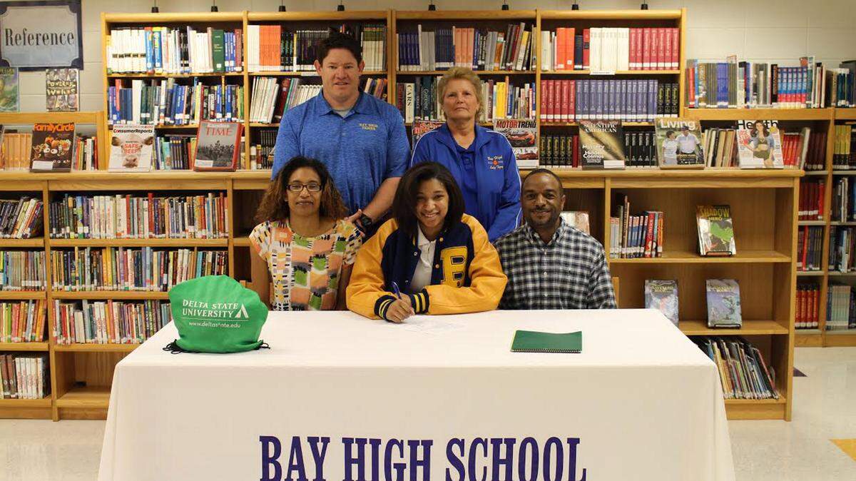 BAY HIGH SCHOOL 
 Bay High's Simone Jackson has signed to play basketball at Delta State. Pictured with Jackson are her mother, Latoya Lymuel, and her stepfather, Jermaine Lymuel, athletics director Will Seymour and coach Debbie Triplett.