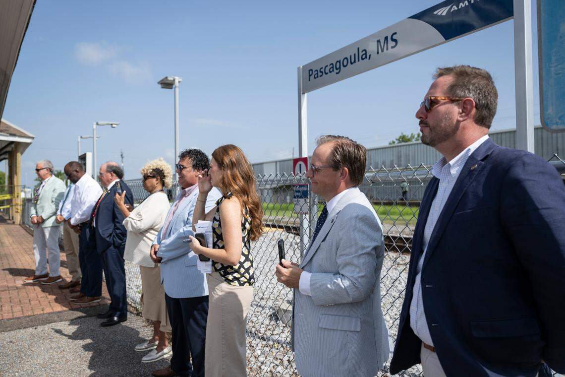 Community leaders listen to a press conference about Amtrak’s Mardi Gras service line outside Pascagoula’s Amtrak stop on Tuesday, July 1, 2025.