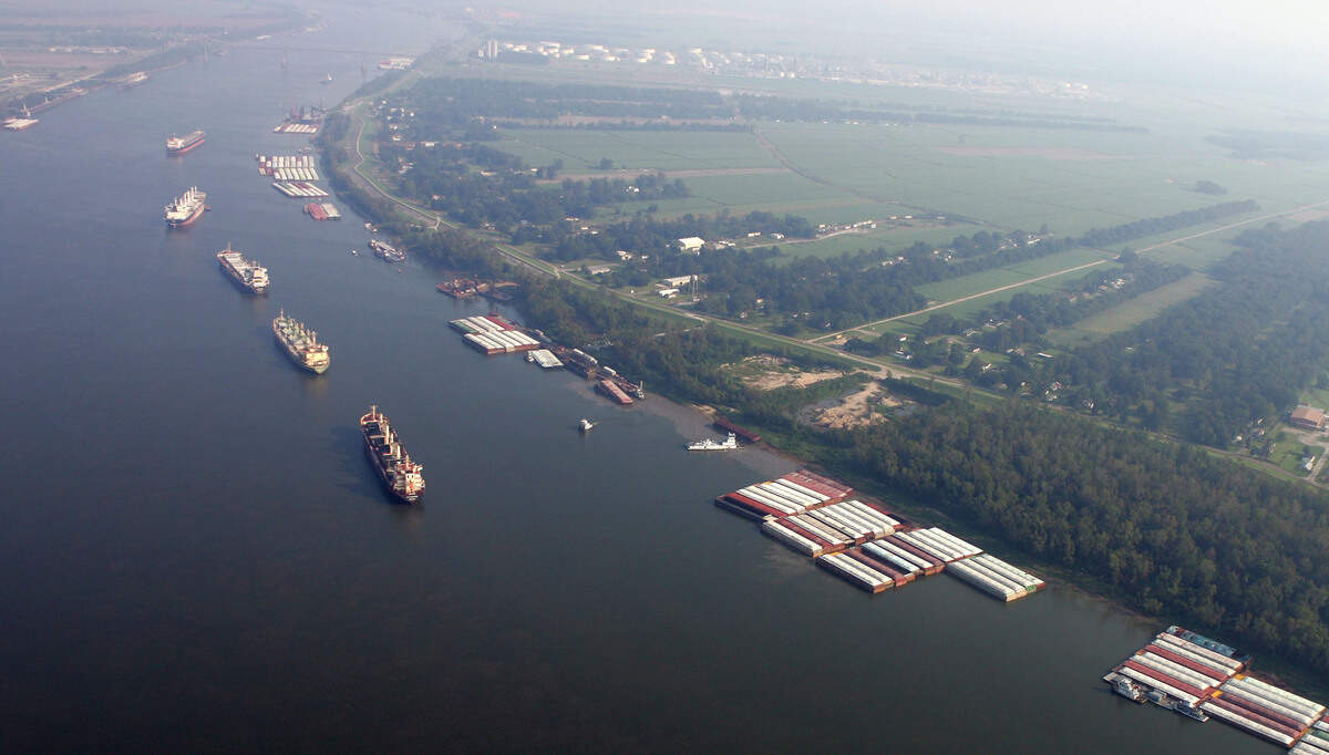 This 2005 file photo shows ships and cargo containers along the Mississippi River in an aerial view, between Baton Rouge and New Orleans.