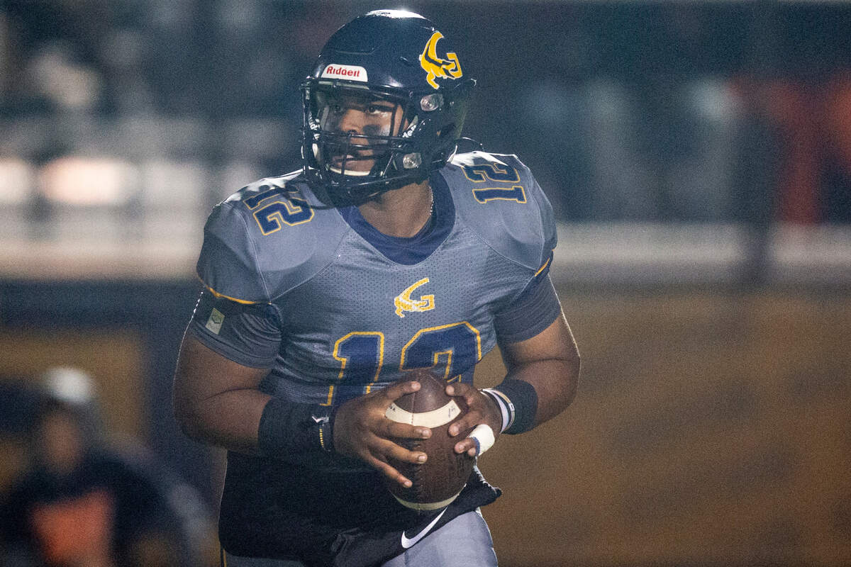 Gautier quarterback Kaden Irving looks to make a pass during a playoff game against Wayne County at Gautier High School in Gautier on Friday, Nov. 11, 2022.