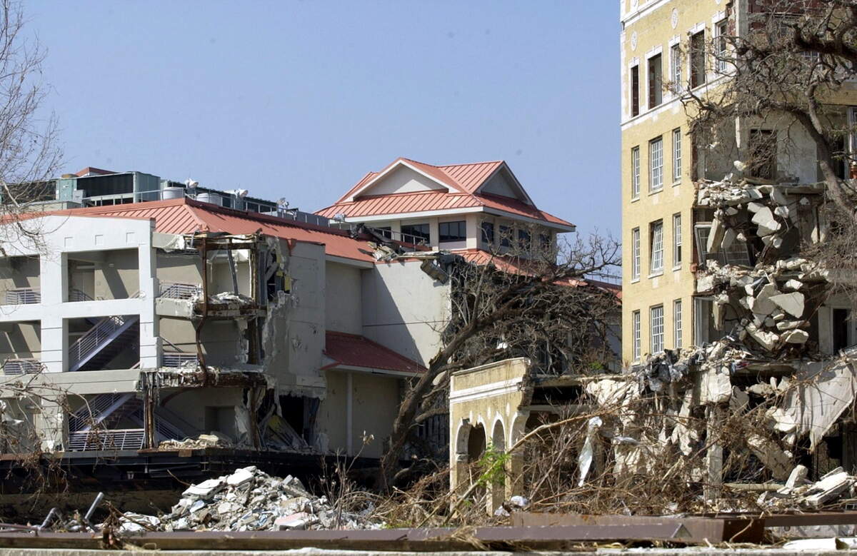 A Grand Casino barge in Biloxi was moored south of U.S. 90, but Hurricane Katrina pushed it north of the highway and to the west, where it sat beside the heavily damaged Tivoli Hotel, which was later torn down.