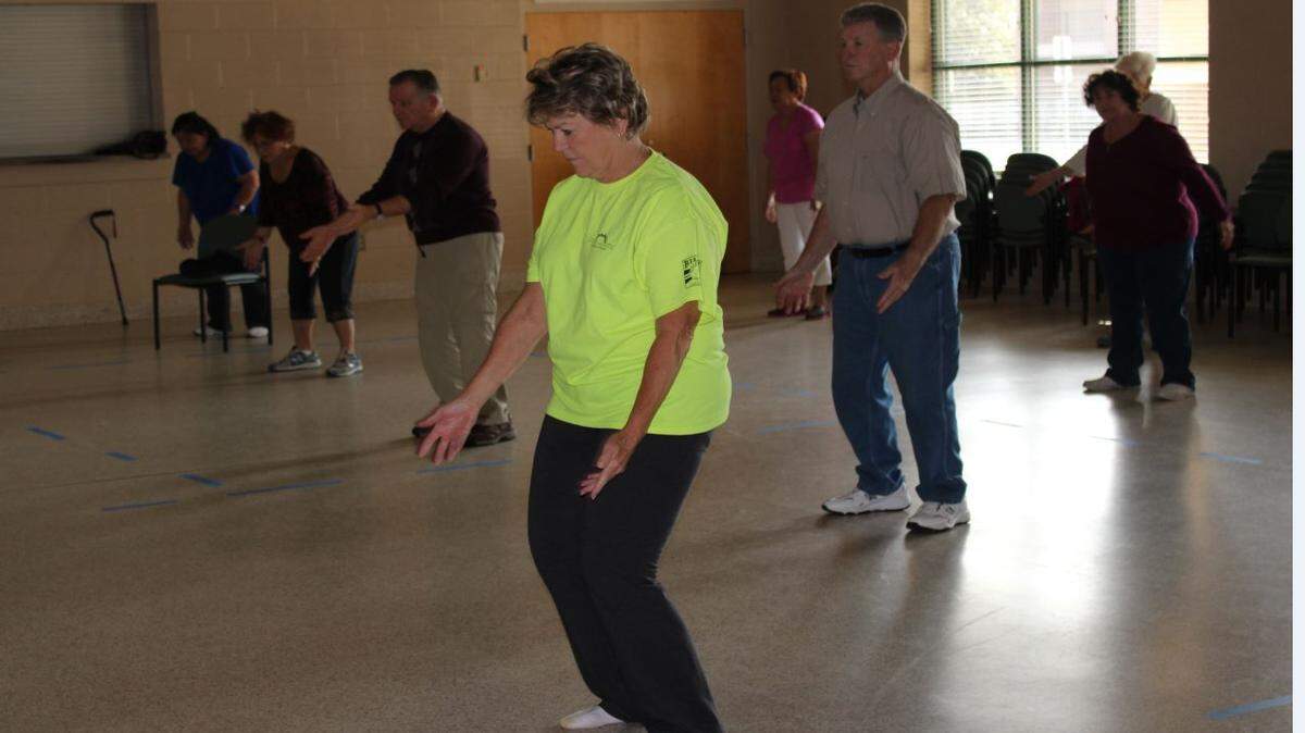 JEFF CLARK/SUN HERALDMelinda Brady practices tai' chi at the Donal Snyder Community Center in Biloxi. Many seniors are using the class as a low impact exercise program.
