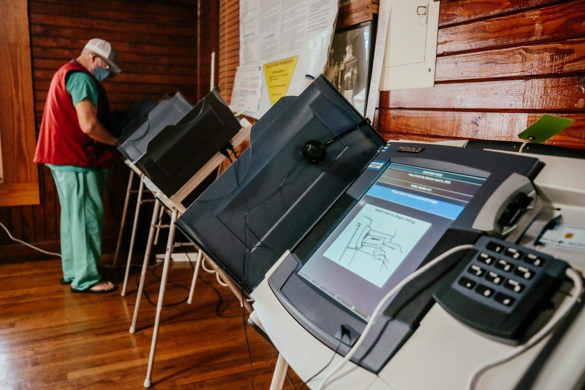 Voting machines were spread out in the Young Men’s Business Club as Moss Point, Mississippi residents came to the polling place to cast their votes in the municipal primary election on Tuesday, April 6, 2021.