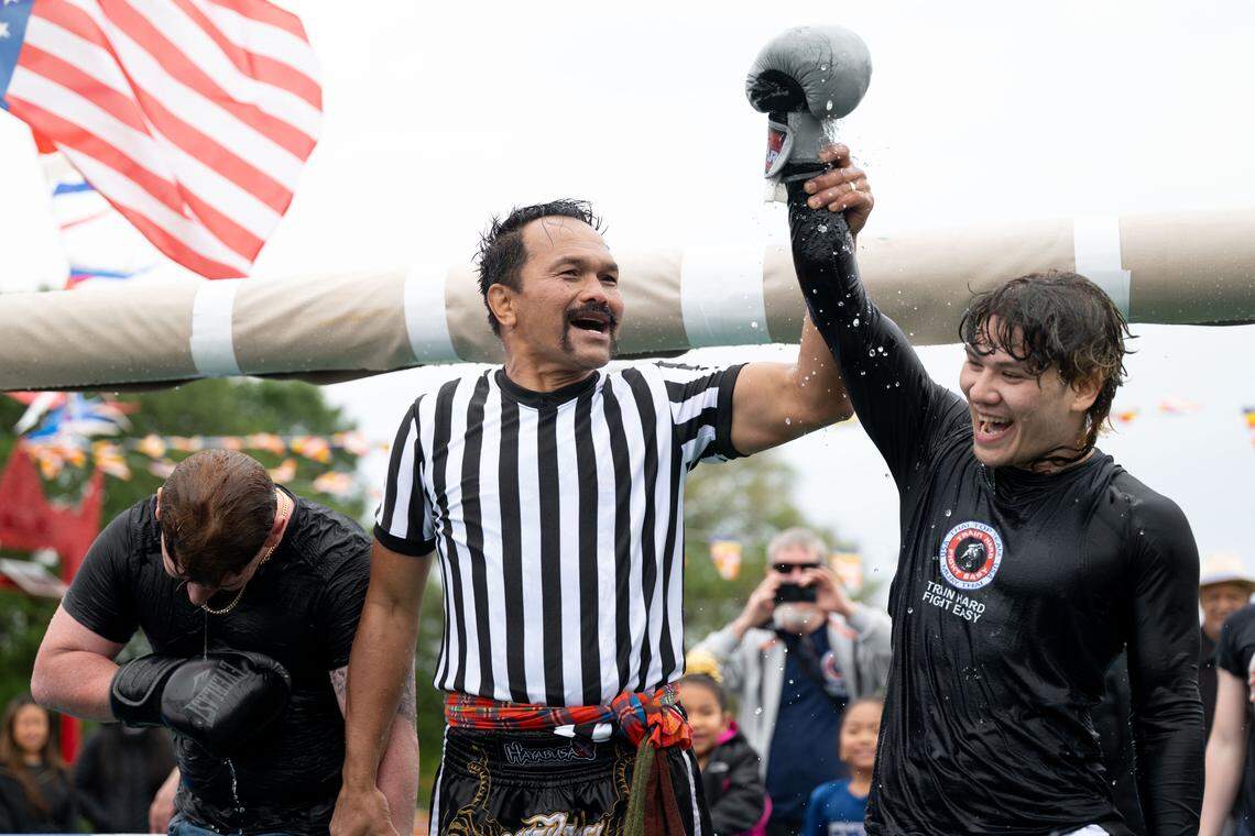 Attendees participate in Thai water boxing during Songkran at the Wat Buddhametta Mahabaramee in Gautier on Sunday, April 19, 2026.