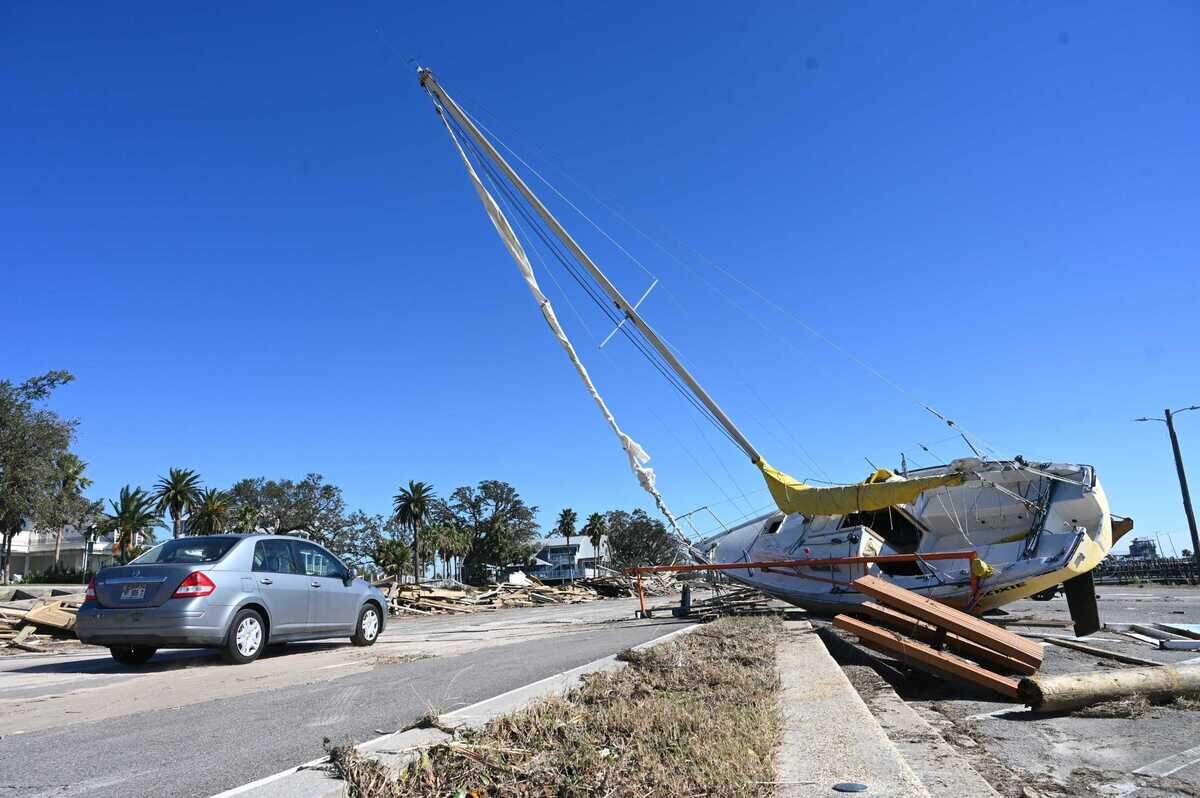 Piles of debris were strewn along Highway 90 in Pass Christian, Mississippi, after Hurricane Zeta tore through the Gulf Coast overnight.