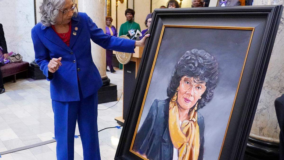 Former State Rep. Alyce Clarke, D-Jackson, inspects her official portrait Tuesday in the Mississippi State Capitol in Jackson.