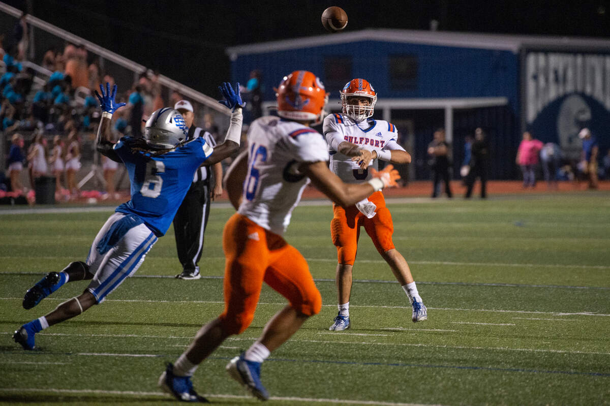Gulfport quarterback Jacob Palazzo throws a pass to Cooper Crosby during a game at Greyhound Stadium in Ocean Springs on Friday, Oct. 28, 2022.
