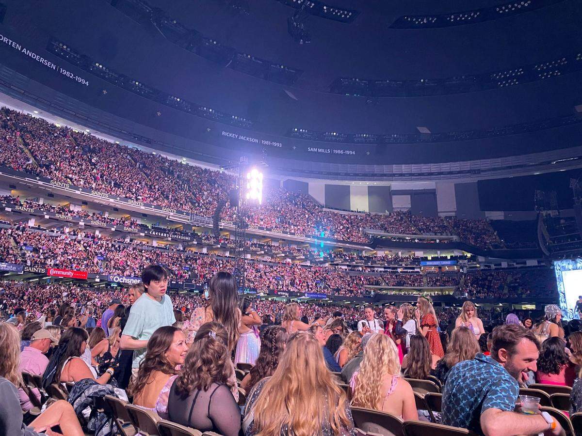 Fans await the arrival of Taylor Swift to the stage Friday, Oct. 25, 2024, at the Superdome in New Orleans.