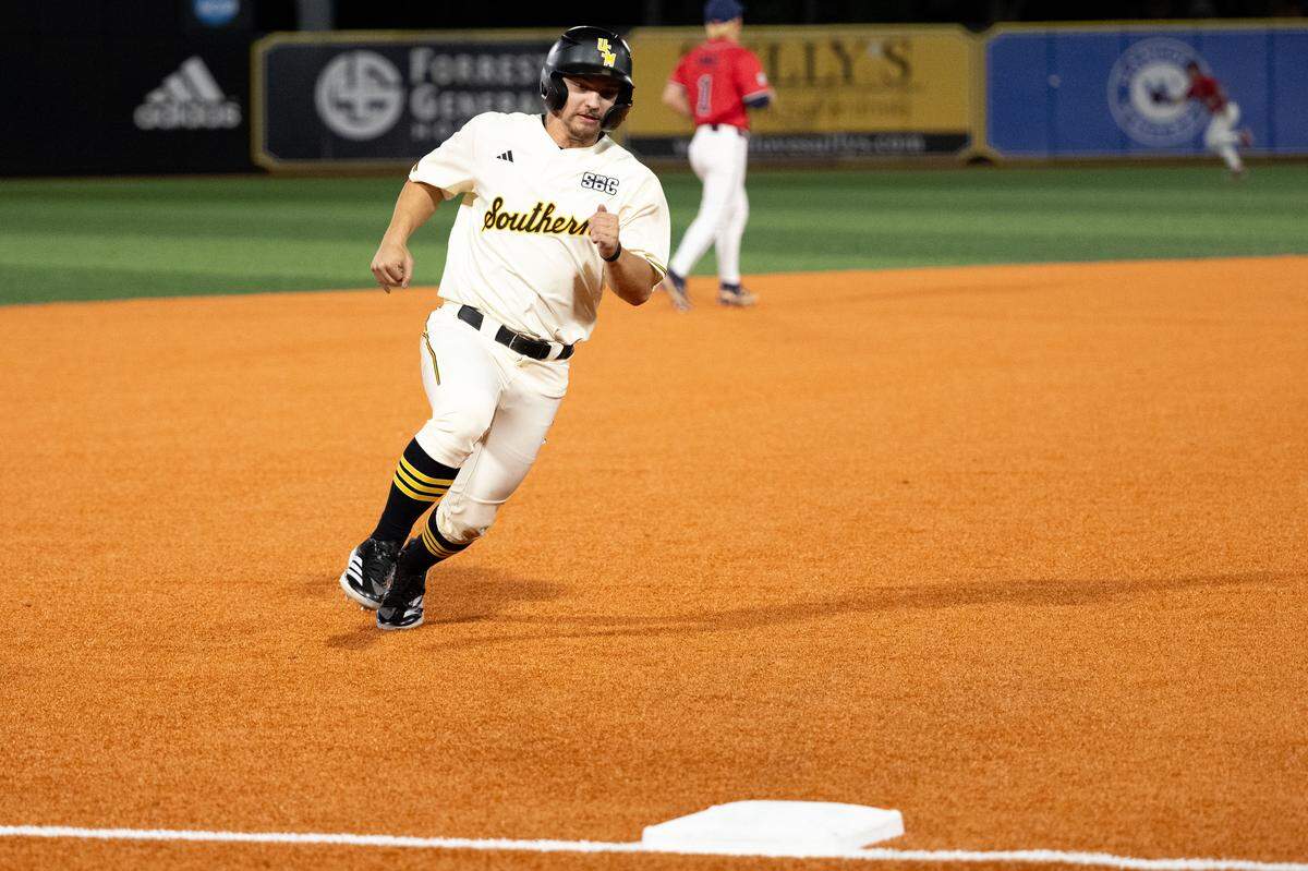Southern Miss outfielder William Tonsmeire (4) runs to third base during a baseball game at Pete Taylor Park in Hattiesburg on Tuesday, March 10, 2026.