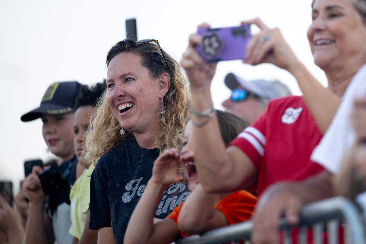 Janelle Ruiz cheers as a car burns out during Burn ‘Em Up In The Pass on Thursday, Oct. 9, 2025.