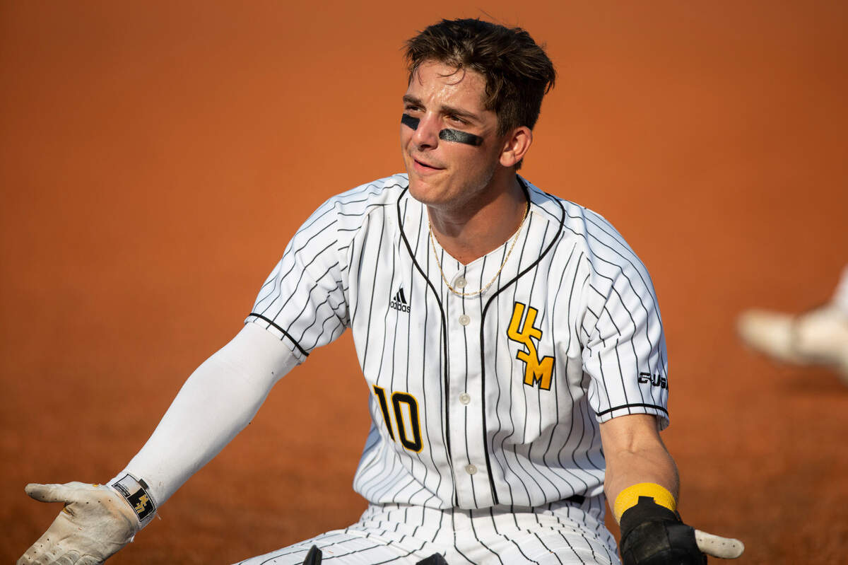 Southern Miss’s Dustin Dickerson shrugs at the referees as they review a play during the NCAA Regionals at Pete Taylor Park in Hattiesburg on Monday, June 6, 2022.